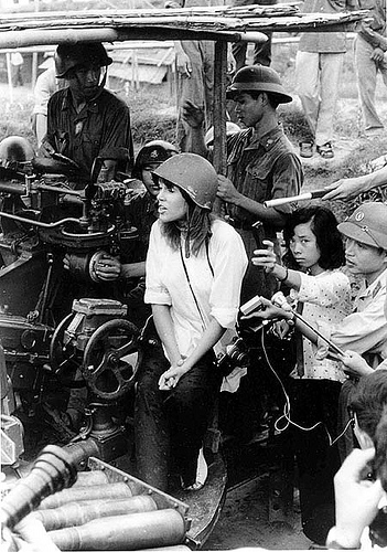 jane fonda vietnam. Jane Fonda wearing a mix of local Vietnamese fashion and military gear in 