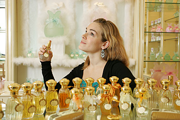 camille Goutal spraying perfume.jpg